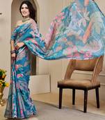 Blue shimmer printed zari saree with unstitched blouse piece.