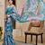 Blue shimmer printed zari saree with unstitched blouse piece.