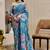 Blue shimmer printed zari saree with unstitched blouse piece.