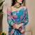 Blue shimmer printed zari saree with unstitched blouse piece.