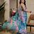 Blue shimmer printed zari saree with unstitched blouse piece.