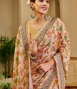 Peach shimmer printed zari saree with unstitched blouse piece.