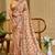 Peach shimmer printed zari saree with unstitched blouse piece.