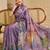 Purple shimmer printed zari saree with unstitched blouse piece.