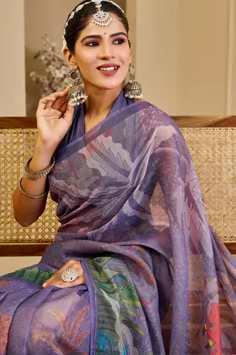 Purple shimmer printed zari saree with unstitched blouse piece.