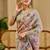 Grey shimmer printed zari saree with unstitched blouse piece.