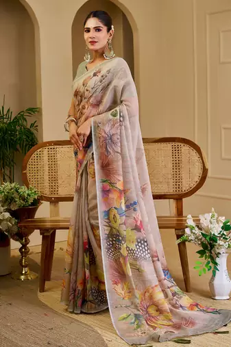 Grey shimmer printed zari saree with unstitched blouse piece.