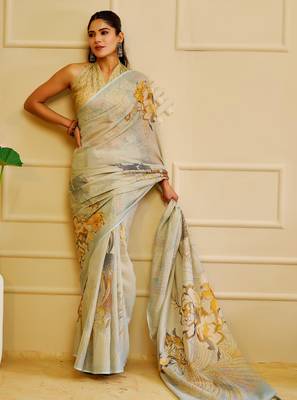 Sky blue shimmer printed zari saree with unstitched blouse piece. 1