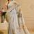 Sky blue shimmer printed zari saree with unstitched blouse piece.