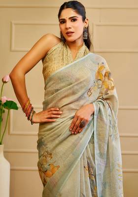 Sky blue shimmer printed zari saree with unstitched blouse piece. 4