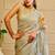 Sky blue shimmer printed zari saree with unstitched blouse piece.