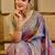 Lavender shimmer printed zari saree with unstitched blouse piece.