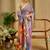 Lavender shimmer printed zari saree with unstitched blouse piece.