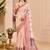 Peach shimmer printed zari saree with unstitched blouse piece.