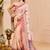 Peach shimmer printed zari saree with unstitched blouse piece.