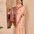 Peach shimmer printed zari saree with unstitched blouse piece.