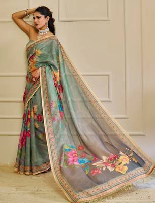 Sea green shimmer printed zari saree with unstitched blouse piece. 1