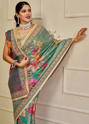 Sea green shimmer printed zari saree with unstitched blouse piece. 4