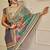 Sea green shimmer printed zari saree with unstitched blouse piece.