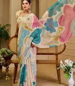 Beige shimmer printed zari saree with unstitched blouse piece.