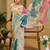 Beige shimmer printed zari saree with unstitched blouse piece.