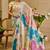 Beige shimmer printed zari saree with unstitched blouse piece.