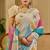 Beige shimmer printed zari saree with unstitched blouse piece.