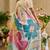 Beige shimmer printed zari saree with unstitched blouse piece.