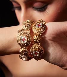 Gold plated ruby red stone bangles