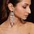 Silver plated green stones dangler earrings
