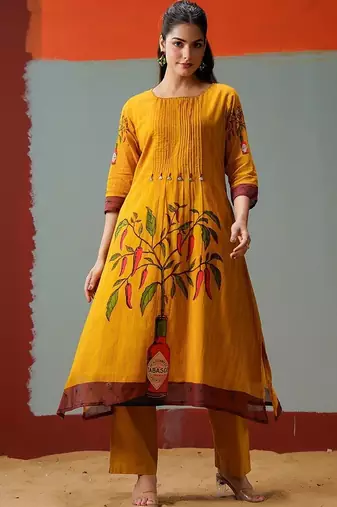 Women Printed Panelled Kurta with Trousers