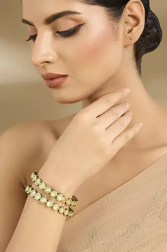 Gold plated mint green oval stones bangles
