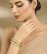 Gold plated mint green oval stones bangles