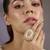 Gold plated peach pink stone ring