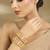 Gold plated baby pink stones floral bangles