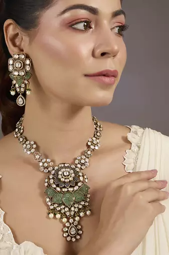 Gold plated kundan green floral pendant necklace set
