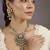 Gold plated kundan green floral pendant necklace set