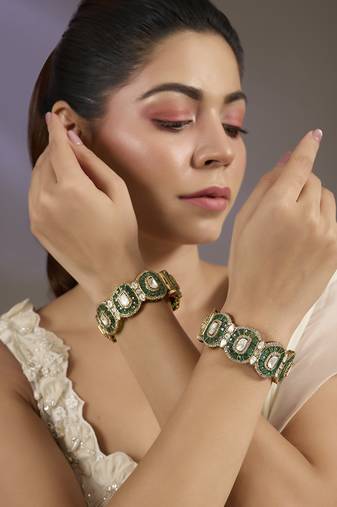 Gold plated green stones oval bangles