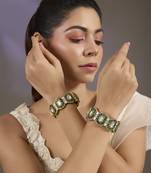 Gold plated green stones oval bangles