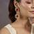 Gold plated red stones dangler drop earrings