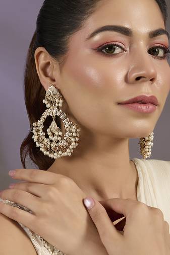 Gold plated white motis chandbali  earrings