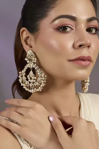 Gold plated white motis chandbali  earrings