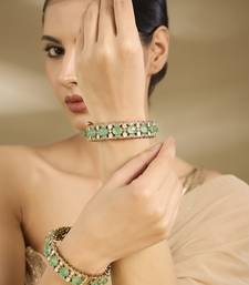 Gold plated pastel green polki stones bangles