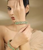 Gold plated pastel green polki stones bangles