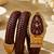gold plated ad studded brown faux leather watch