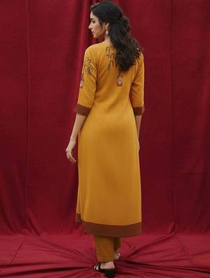 Cotton Mustard Kurta Set With Pintuck Detailing Paired With Solid Trouser. 2