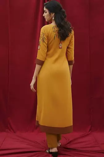 Cotton Mustard Kurta Set With Pintuck Detailing Paired With Solid Trouser.