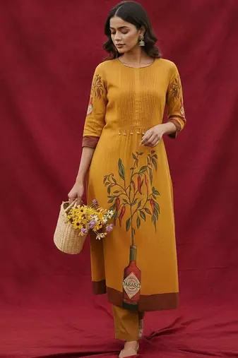 Cotton Mustard Kurta Set With Pintuck Detailing Paired With Solid Trouser.