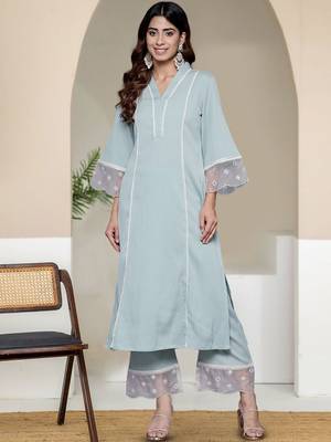 Women Solid Kurta with Trousers 1