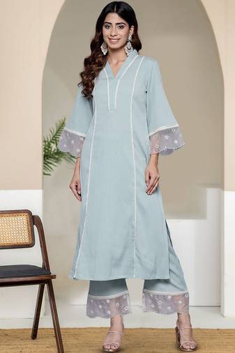 Women Solid Kurta with Trousers